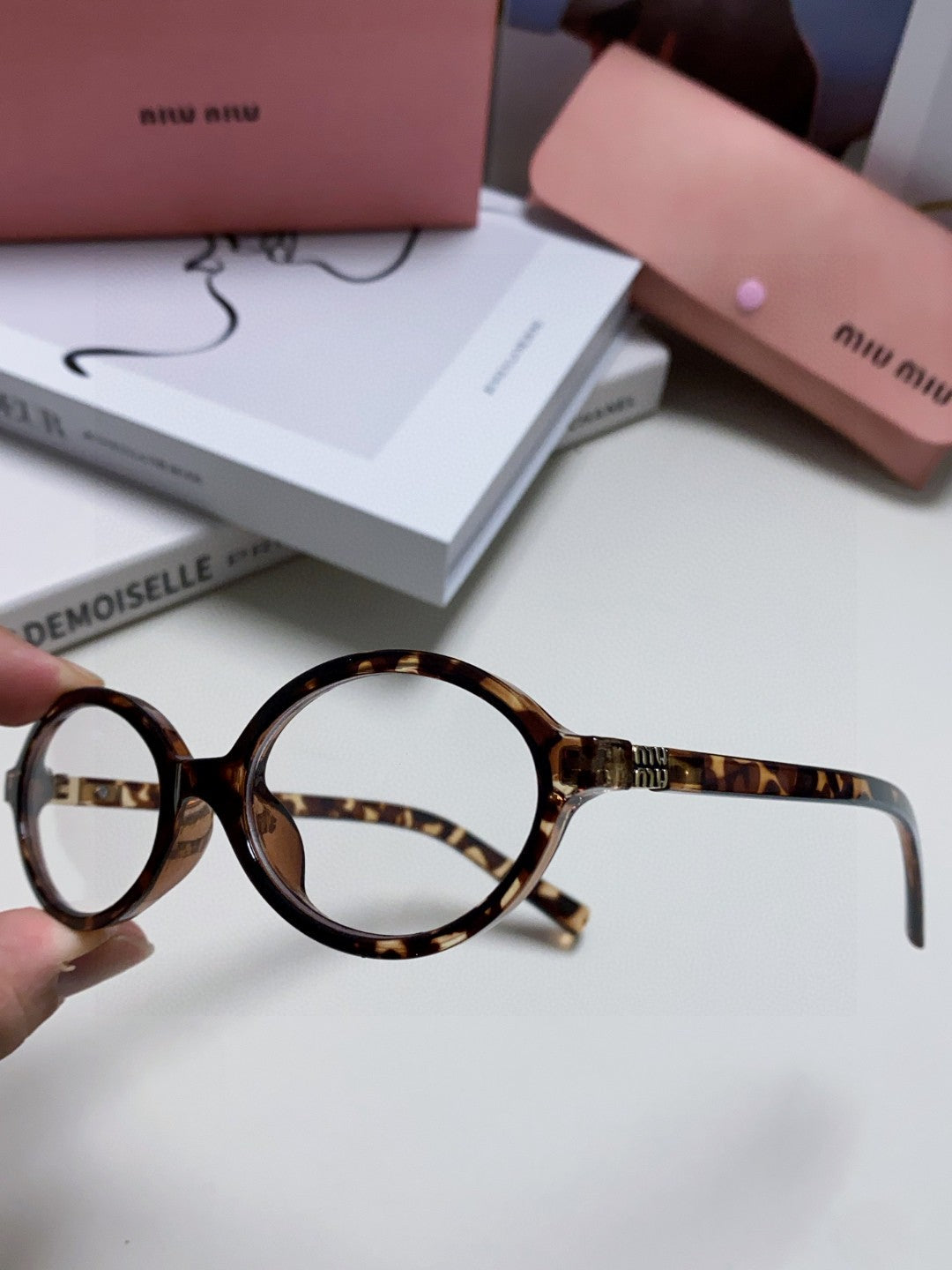 Miu Miu Round Black Lens Sunglasses for Men & Women - detail image 5