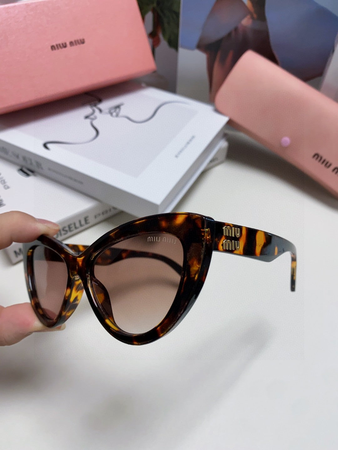 Miu Miu Cat-Eye Brown Lens Sunglasses for Men & Women - detail image 7