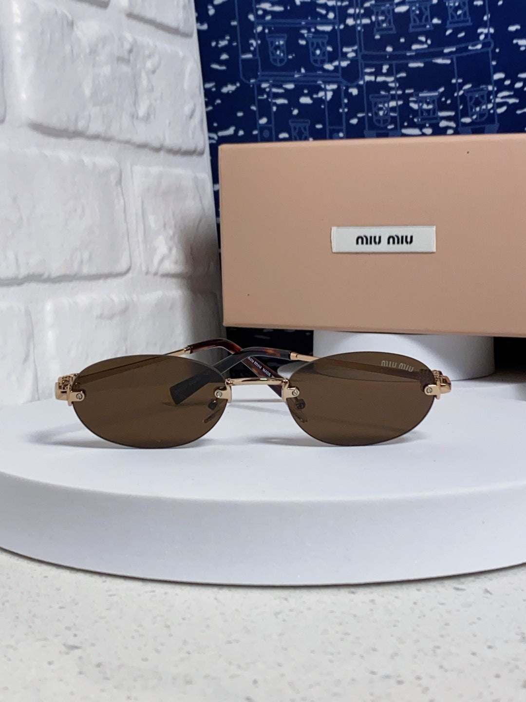Miu Miu Lightweight Metal Rimless Brown Lens Sunglasses for Women - detail image 2