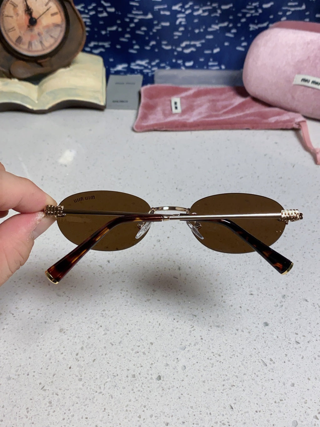 Miu Miu Lightweight Metal Rimless Brown Lens Sunglasses for Women - detail image 5