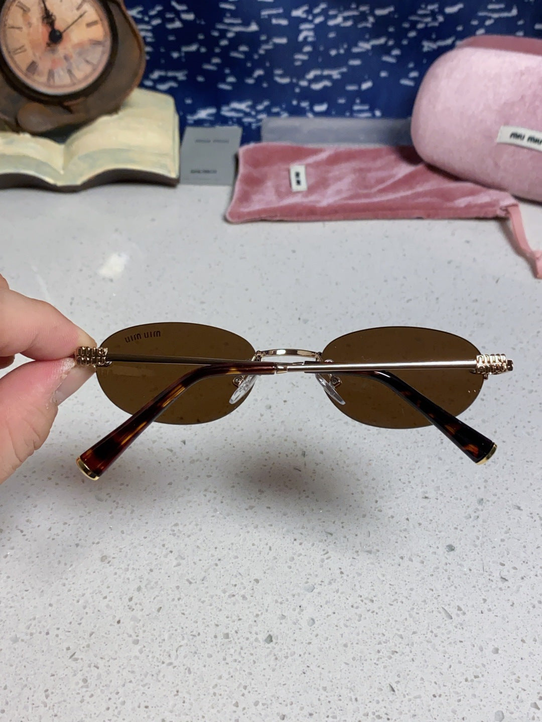 Miu Miu Lightweight Metal Rimless Brown Lens Sunglasses for Women - detail image 5
