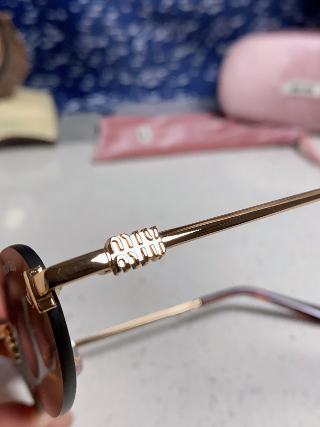 Miu Miu Lightweight Metal Rimless Brown Lens Sunglasses for Women - detail image 7