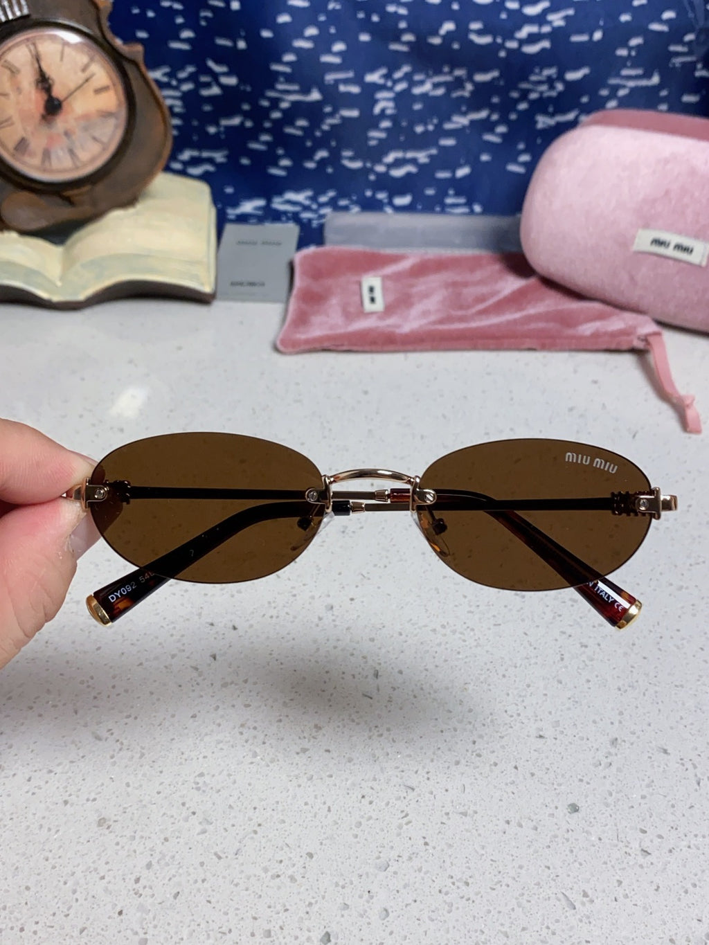 Miu Miu Lightweight Metal Rimless Brown Lens Sunglasses for Women - detail image 4