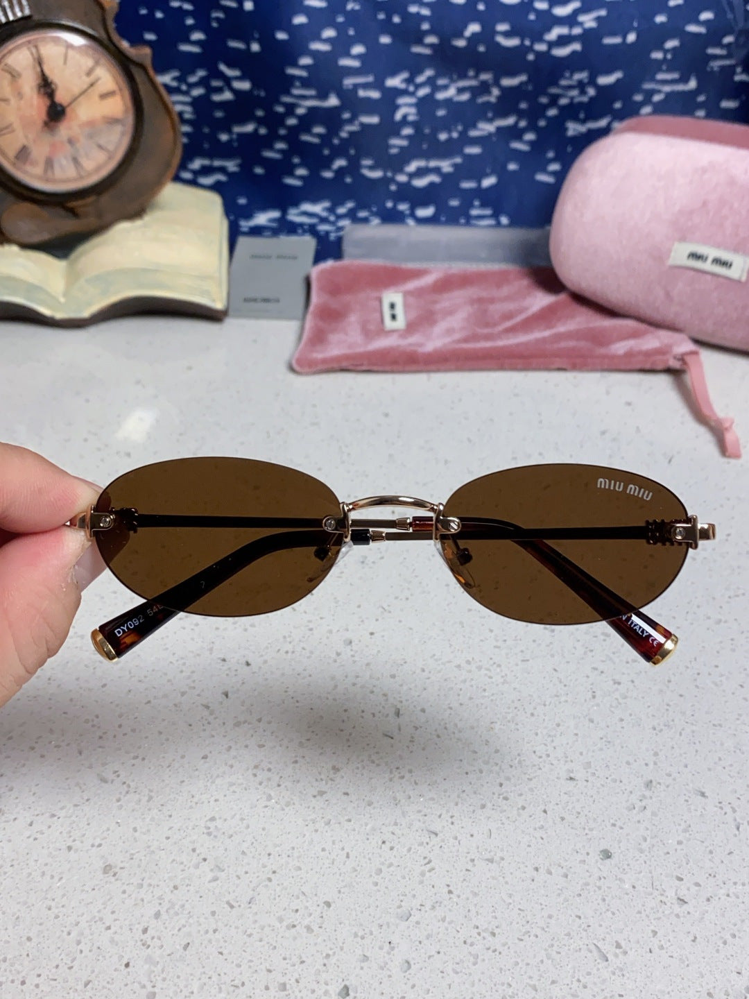 Miu Miu Lightweight Metal Rimless Brown Lens Sunglasses for Women - detail image 4