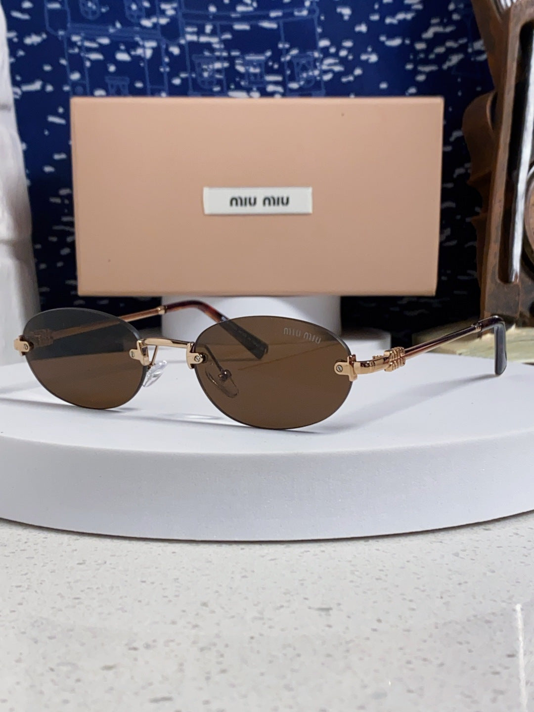 Miu Miu Lightweight Metal Rimless Brown Lens Sunglasses for Women