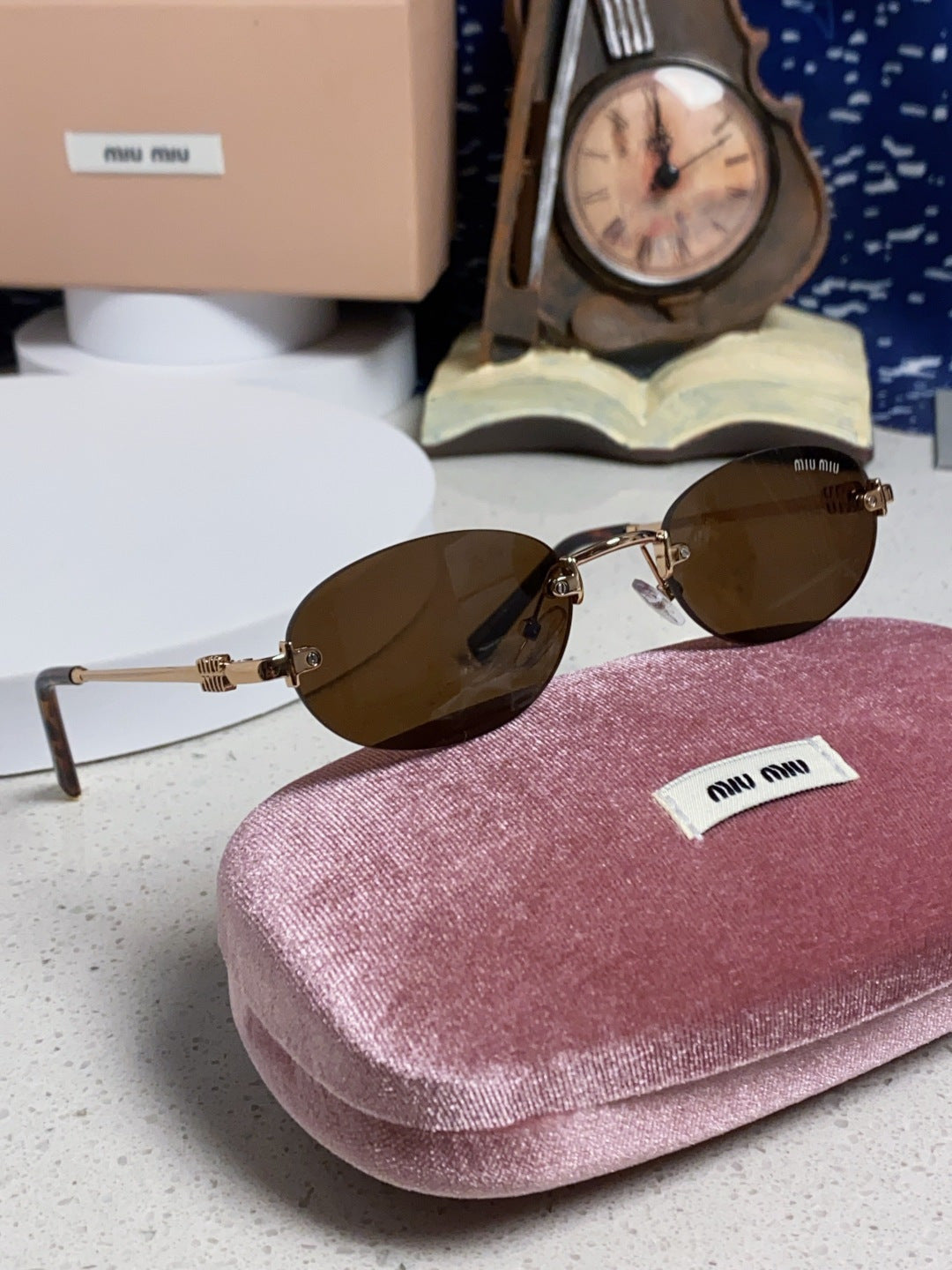 Miu Miu Lightweight Metal Rimless Brown Lens Sunglasses for Women - detail image 10
