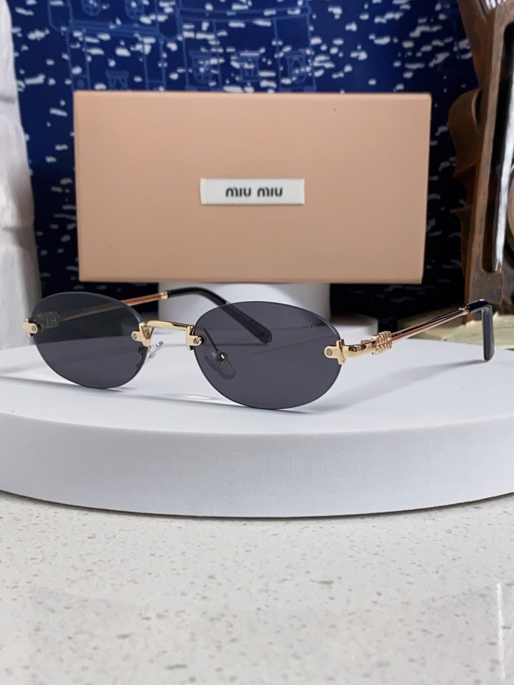 Miu Miu Lightweight Metal Rimless Silver Lens Sunglasses for Women