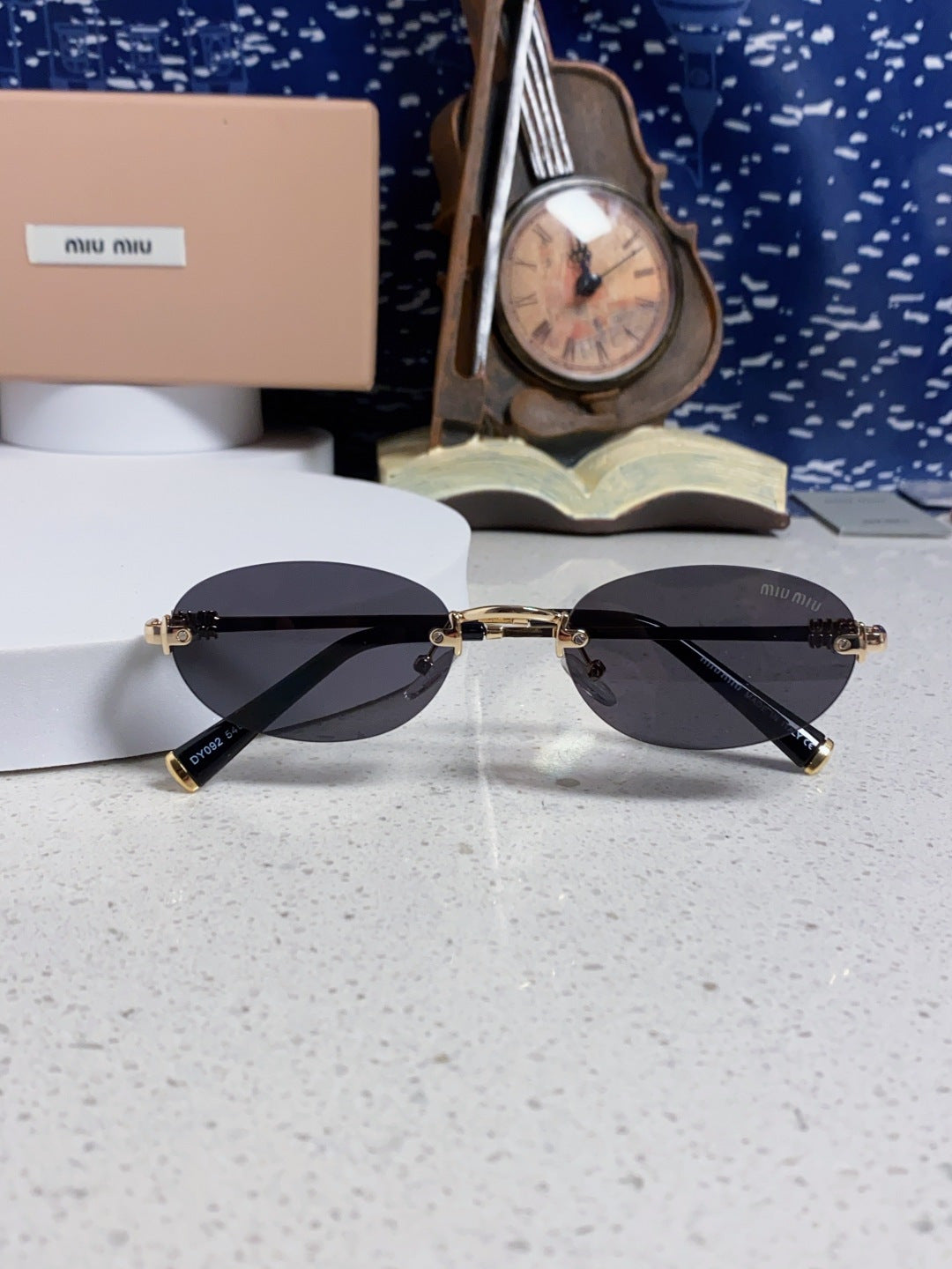 Miu Miu Lightweight Metal Rimless Silver Lens Sunglasses for Women - detail image 8