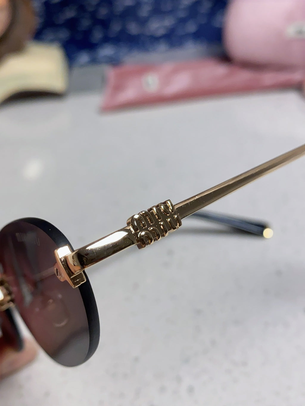 Miu Miu Lightweight Metal Rimless Silver Lens Sunglasses for Women - detail image 6