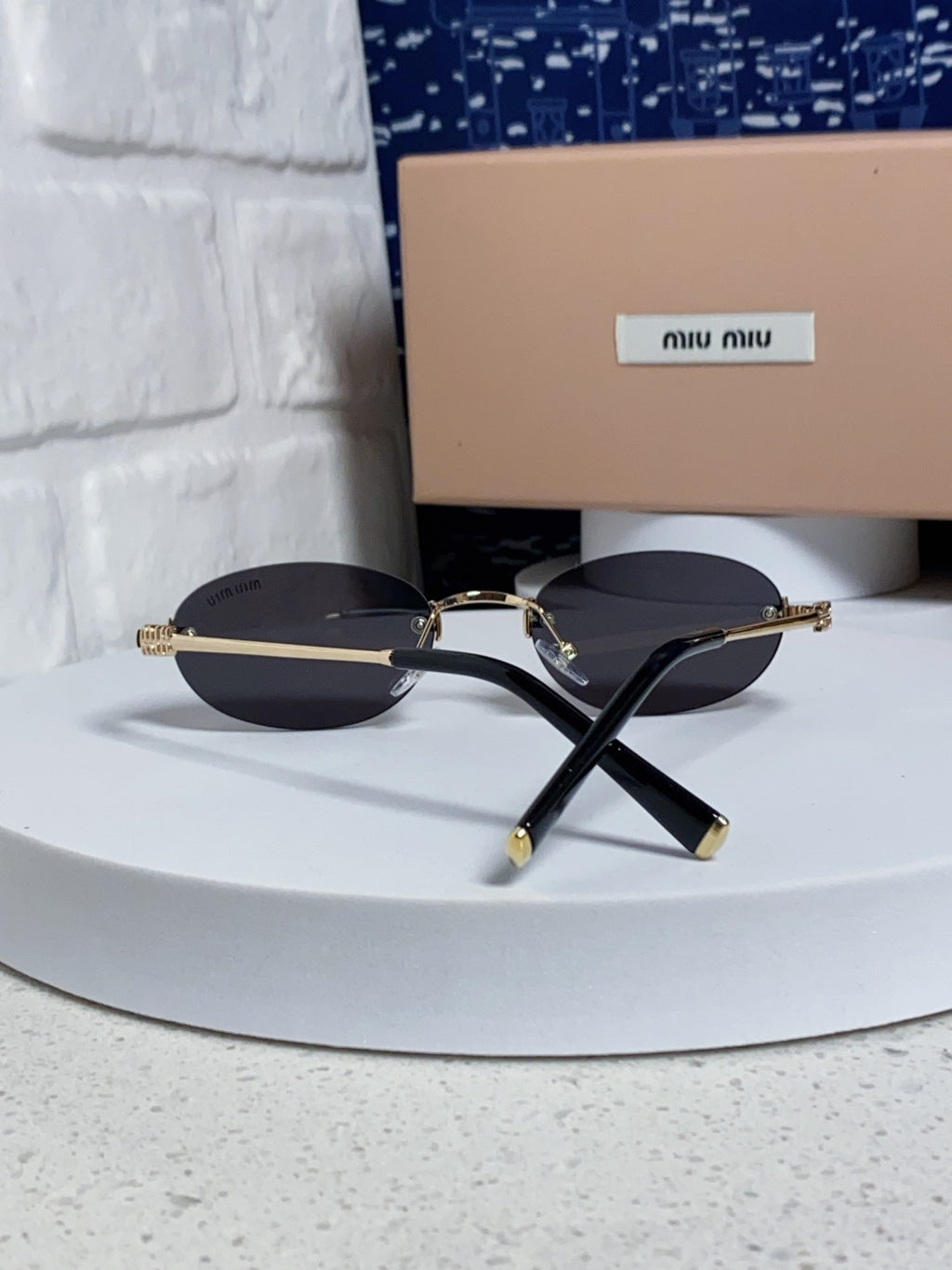 Miu Miu Lightweight Metal Rimless Silver Lens Sunglasses for Women - detail image 3