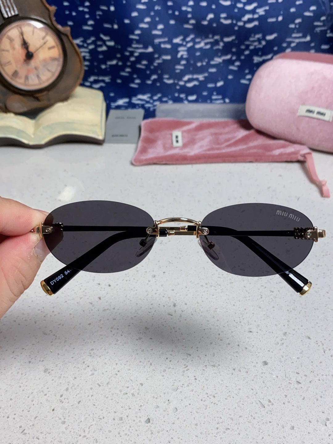 Miu Miu Lightweight Metal Rimless Silver Lens Sunglasses for Women - detail image 4