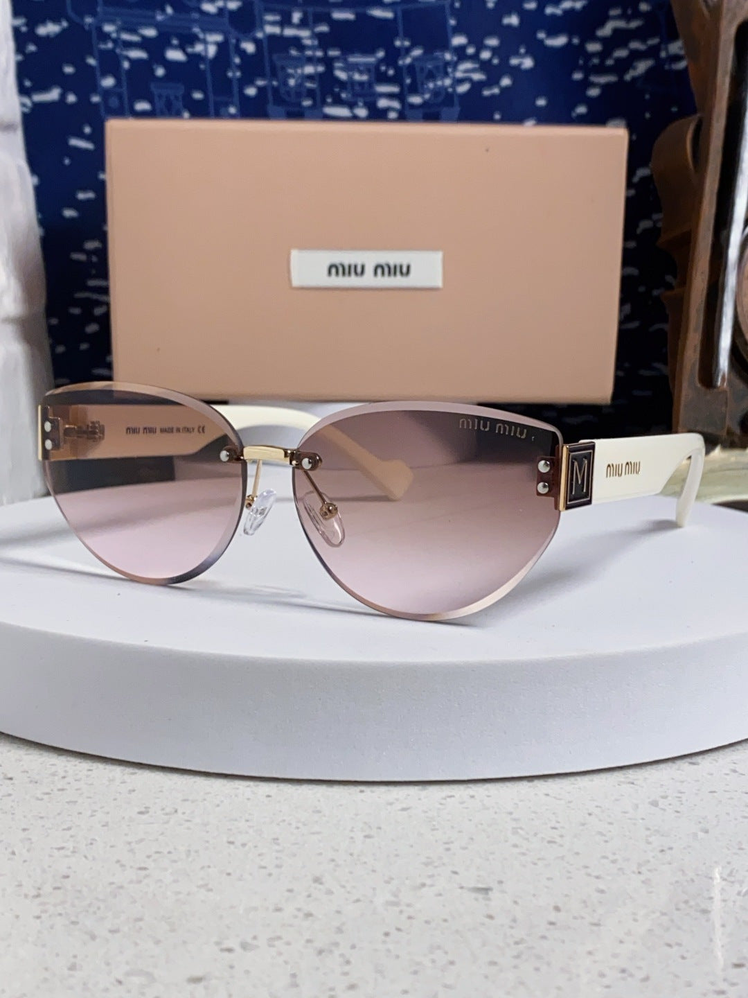 Miu Miu Lightweight Rimless Silver Lens Sunglasses for Women - 449696