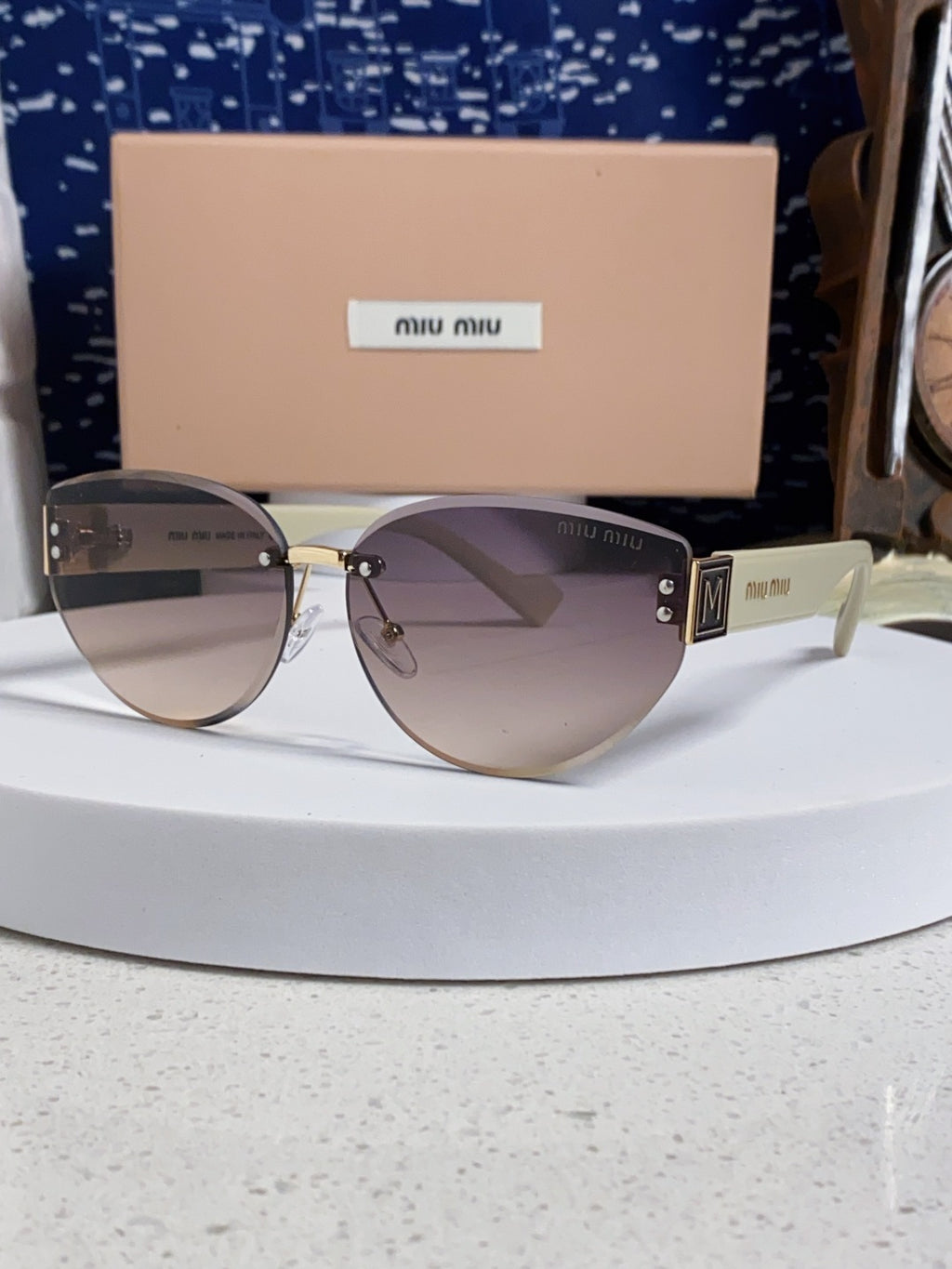 Miu Miu Lightweight Rimless Silver Lens Sunglasses for Women - 449697