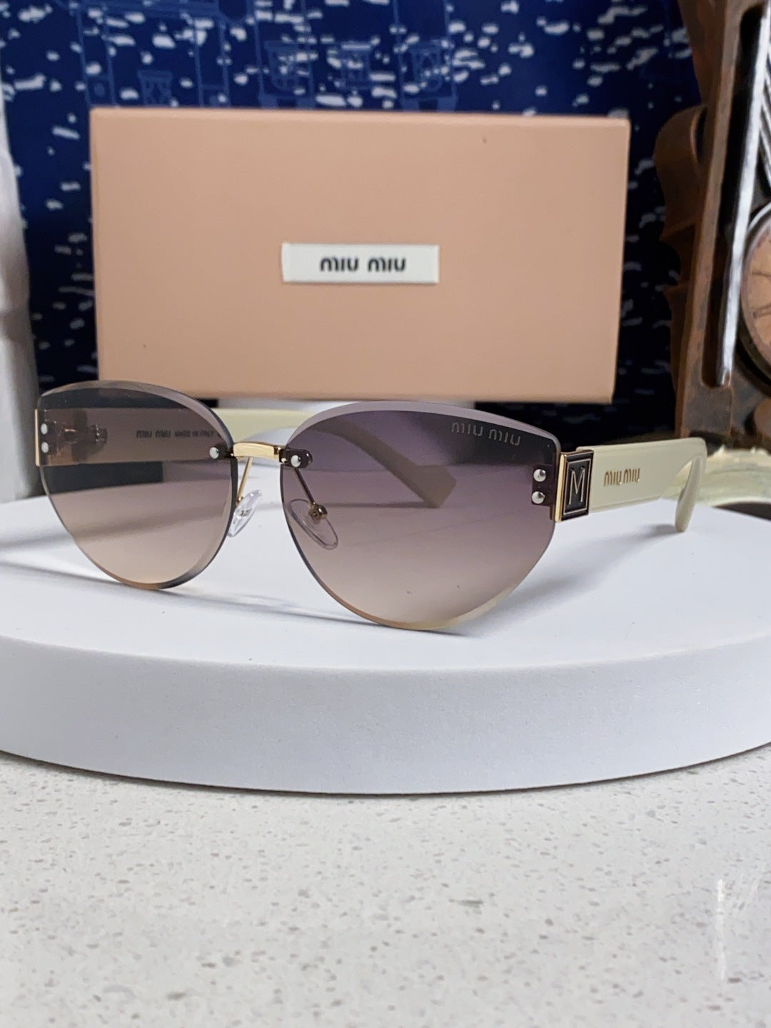 Miu Miu Lightweight Rimless Silver Lens Sunglasses for Women - 449697