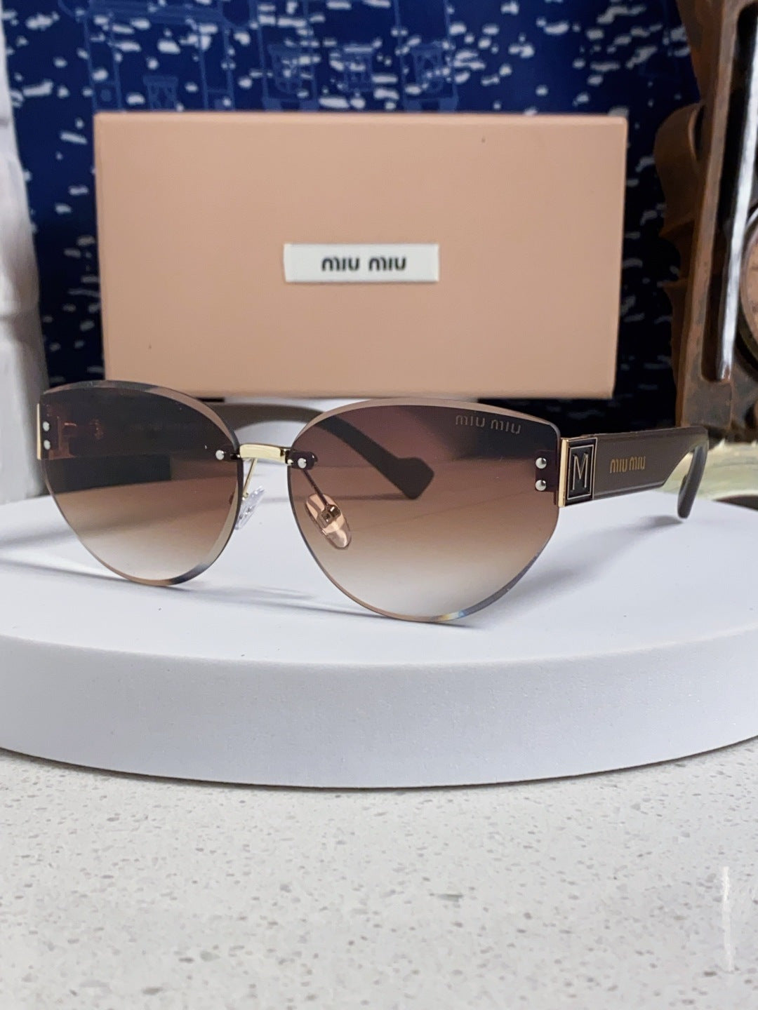 Miu Miu Lightweight Rimless Red Lens Sunglasses for Women - 449698