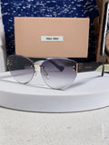 Miu Miu Lightweight Rimless Silver Lens Sunglasses for Women - 449699