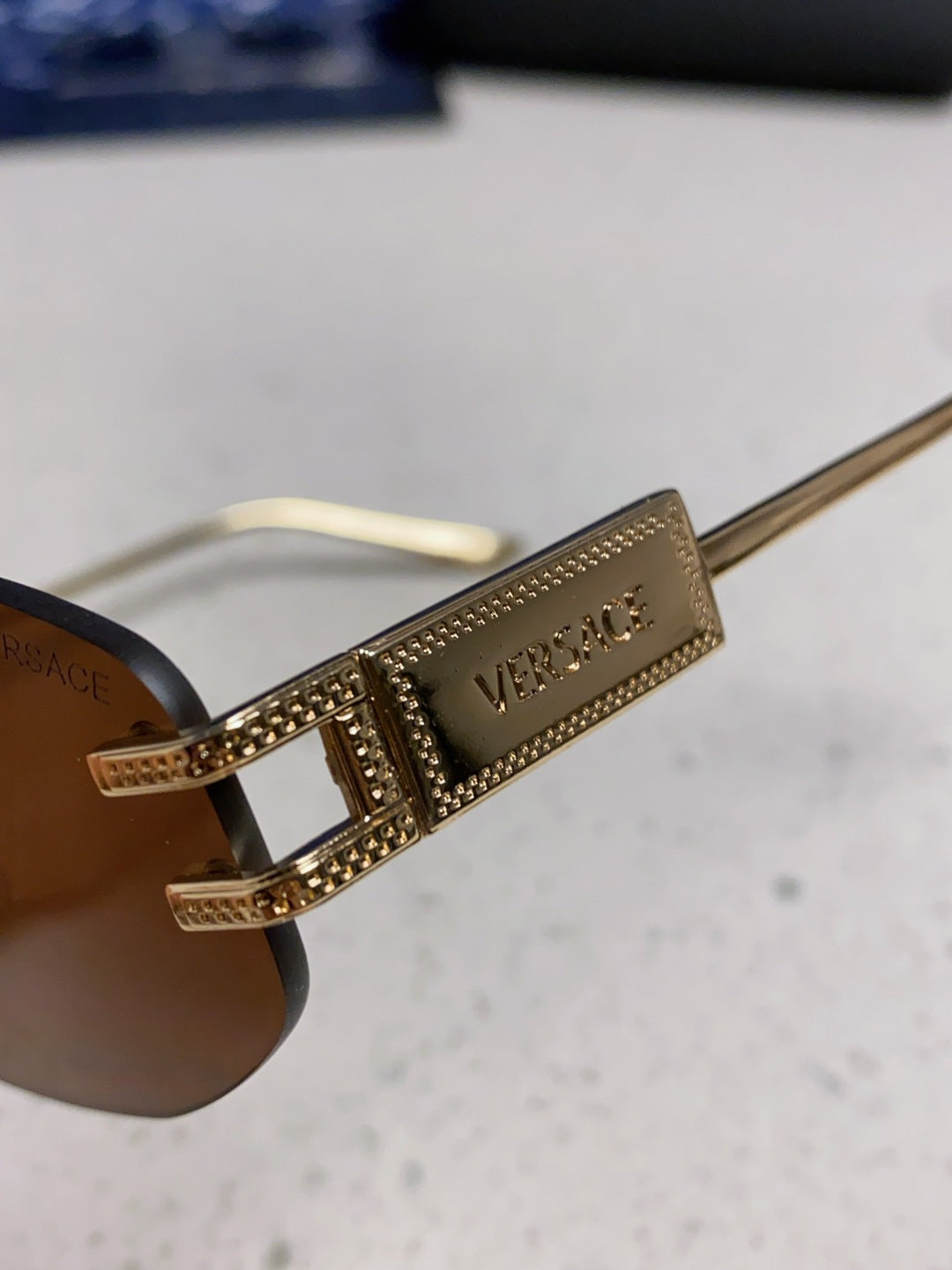 Versace VE2274 Lightweight Metal Rimless Brown Lens Sunglasses for Men & Women - detail image 7