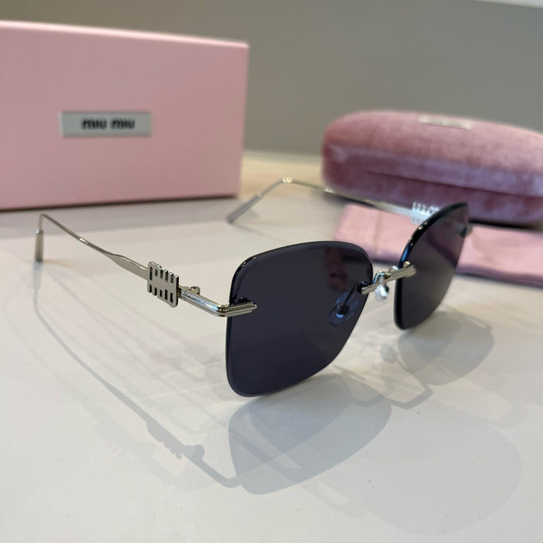 Miu Miu Lightweight Rimless Silver Lens Sunglasses for Women