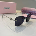 Miu Miu Lightweight Rimless Silver Lens Sunglasses for Women - 432602