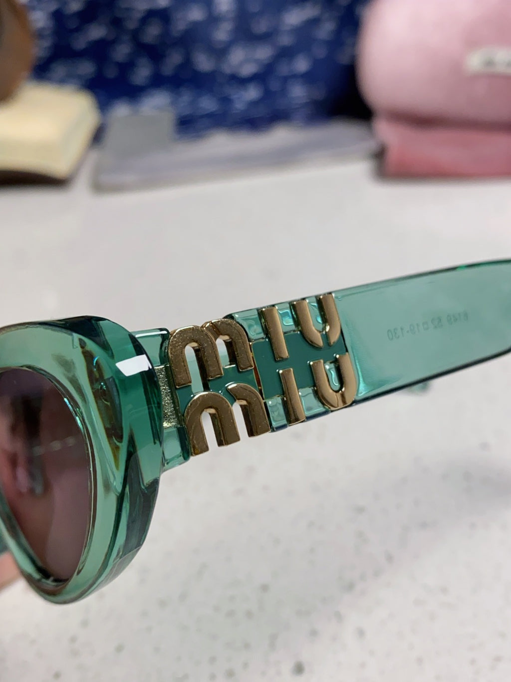 Miu Miu Cat-Eye Blue Lens Sunglasses for Men & Women - detail image 7