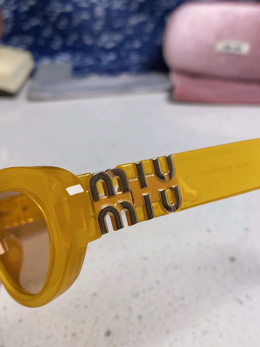 Miu Miu Cat-Eye Orange Lens Sunglasses for Men & Women - detail image 7