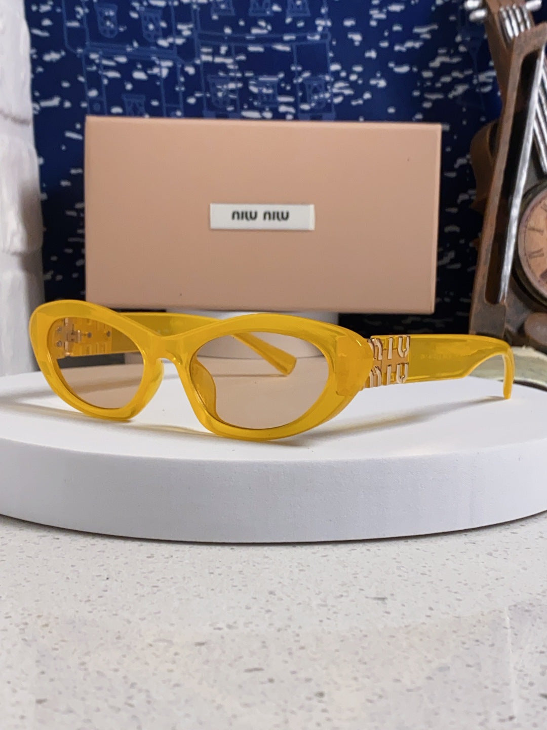 Miu Miu Cat-Eye Orange Lens Sunglasses for Men & Women