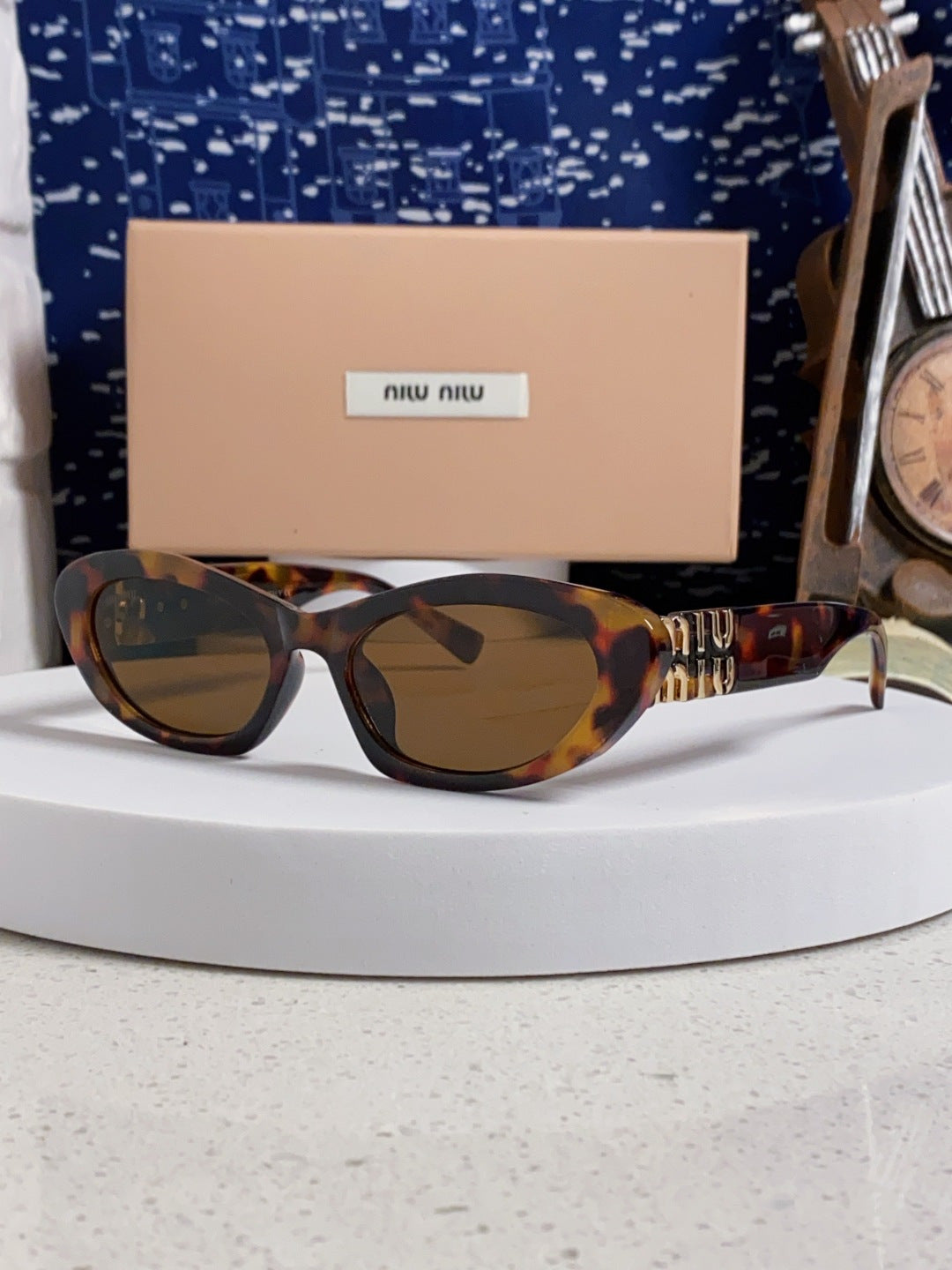 Miu Miu Cat-Eye Brown Lens Sunglasses for Men & Women - 487631