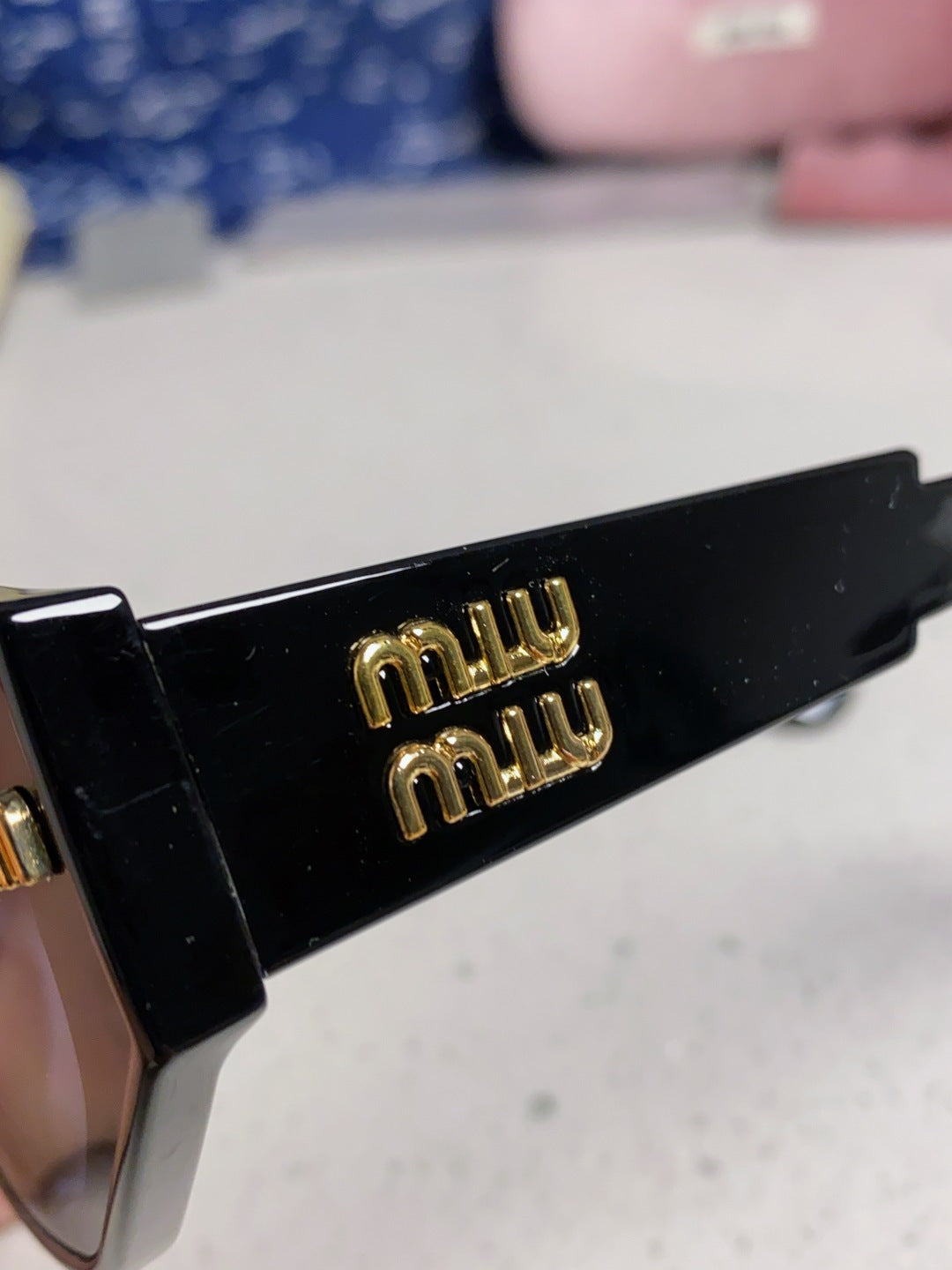 Miu Miu Cat-Eye Blue Lens Sunglasses for Women - detail image 7