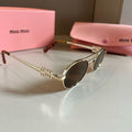 Miu Miu Metal Fashion Brown Lens Sunglasses for Men & Women - 449677