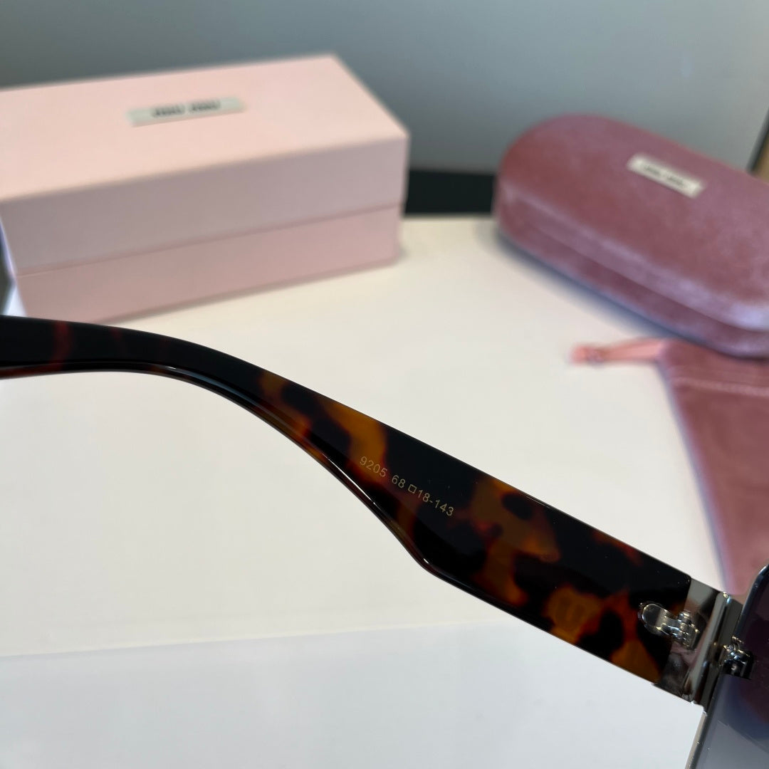 Miu Miu Lightweight Rimless Black Lens Sunglasses for Women - detail image 6