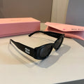 Miu Miu Cat-Eye Gold Lens Sunglasses for Men & Women