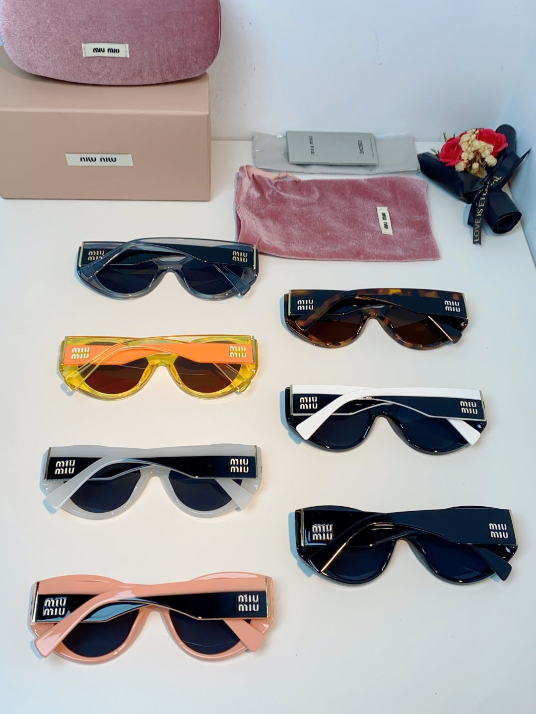 Miu Miu Polarized Cat-Eye Black Lens Sunglasses for Men & Women - detail image 11