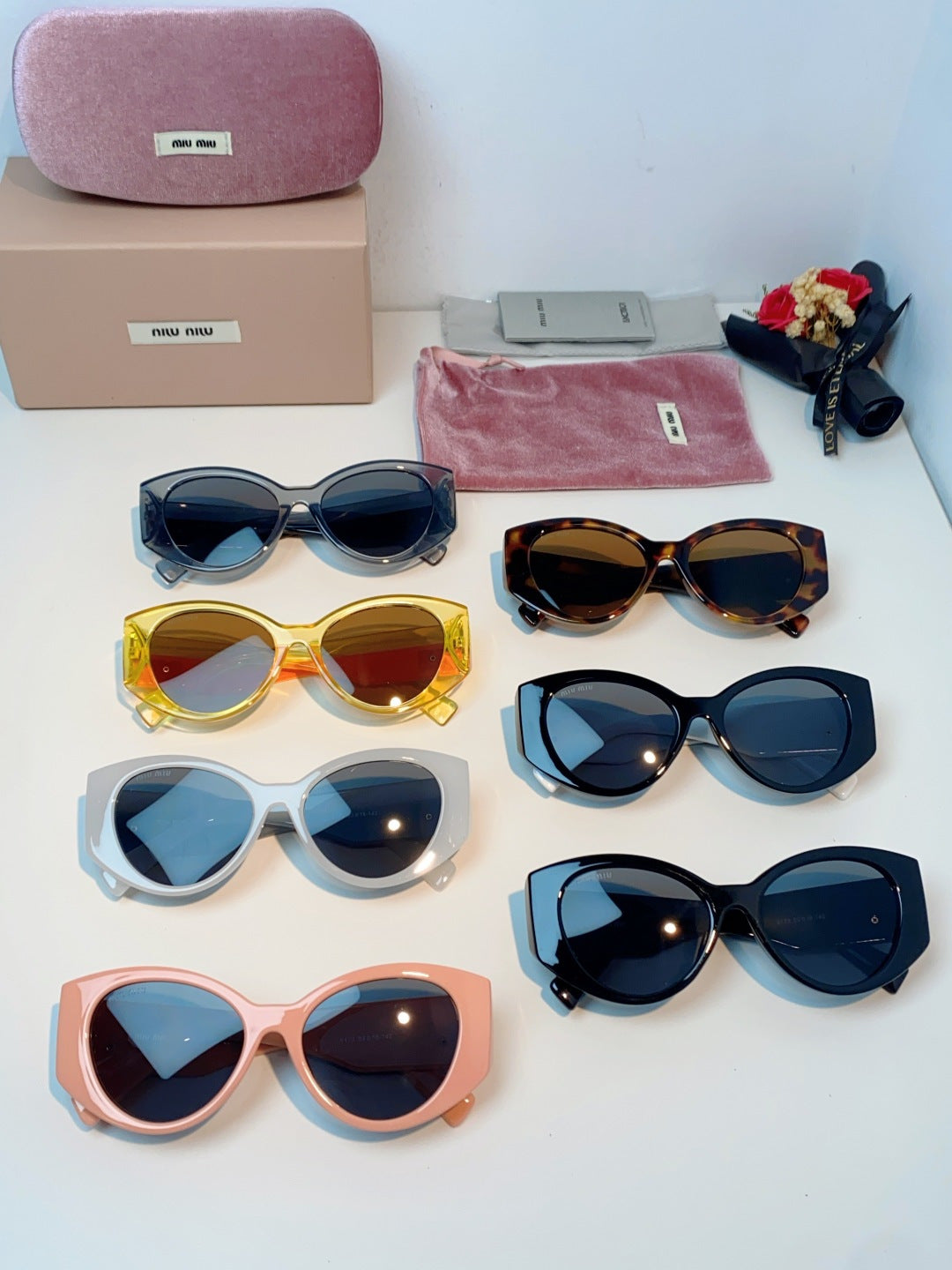 Miu Miu Polarized Cat-Eye Red Lens Sunglasses for Men & Women - detail image 12