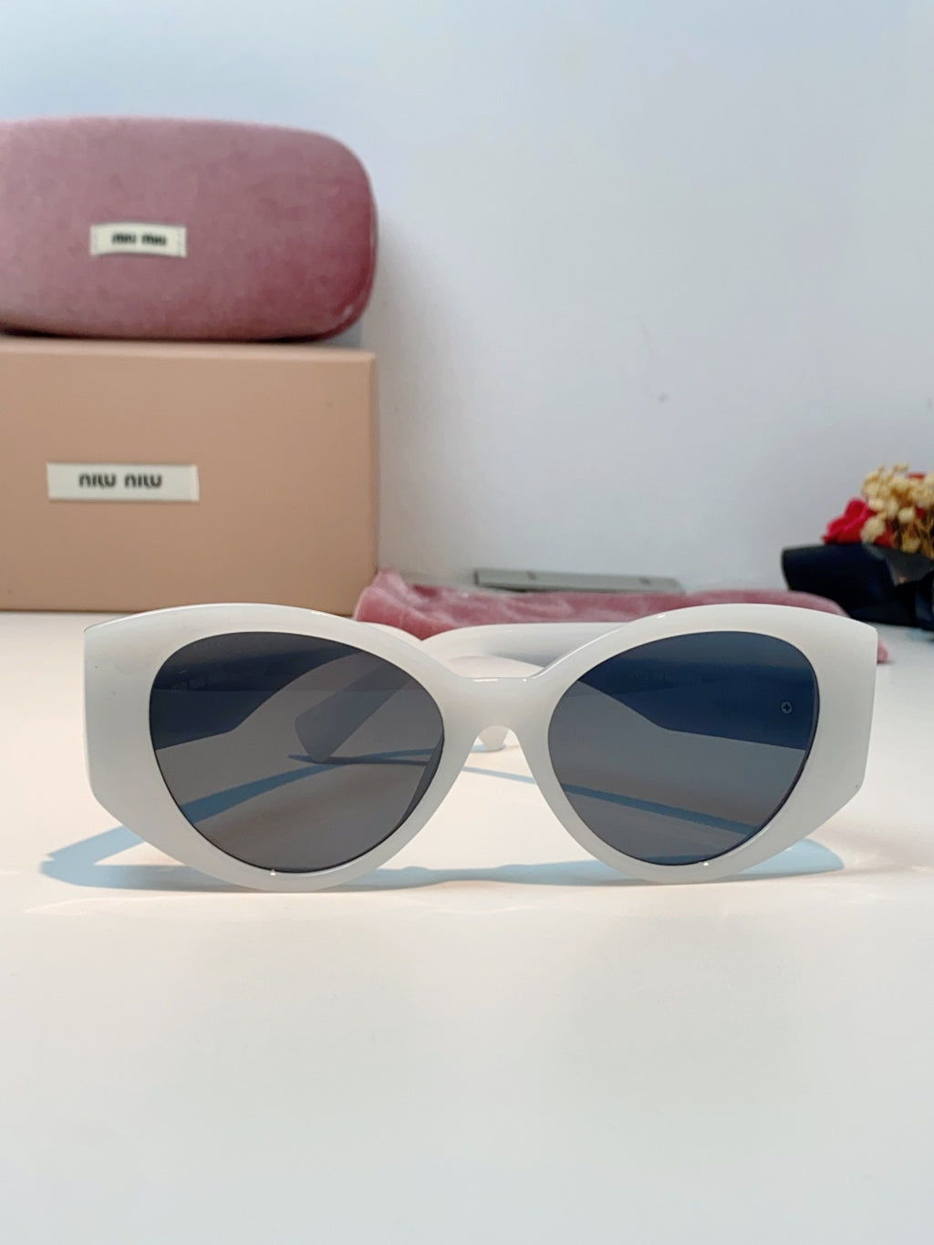 Miu Miu Polarized Cat-Eye Gray Lens Sunglasses for Men & Women - detail image 2