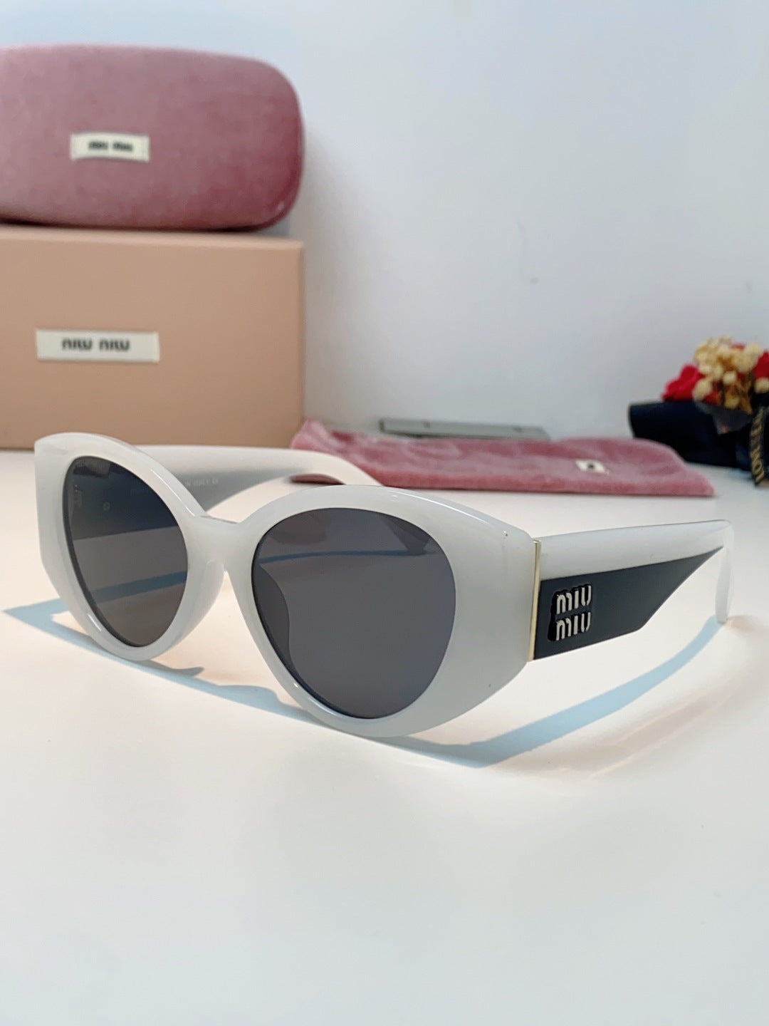 Miu Miu Polarized Cat-Eye Gray Lens Sunglasses for Men & Women