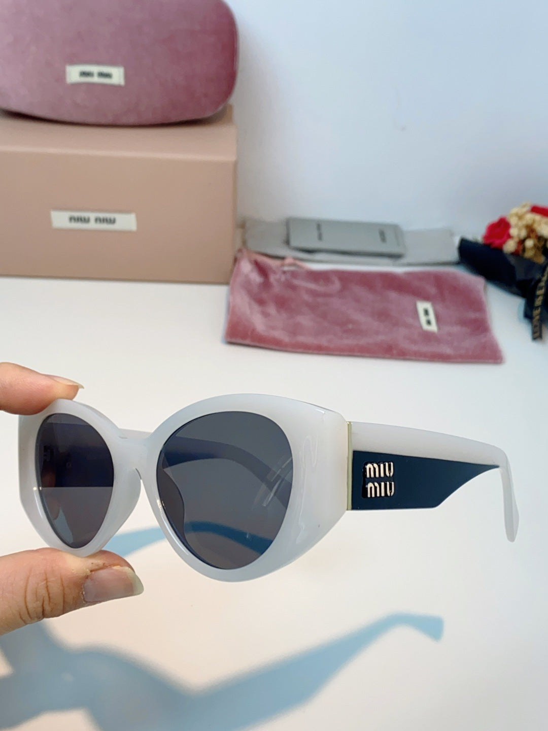 Miu Miu Polarized Cat-Eye Gray Lens Sunglasses for Men & Women - detail image 6
