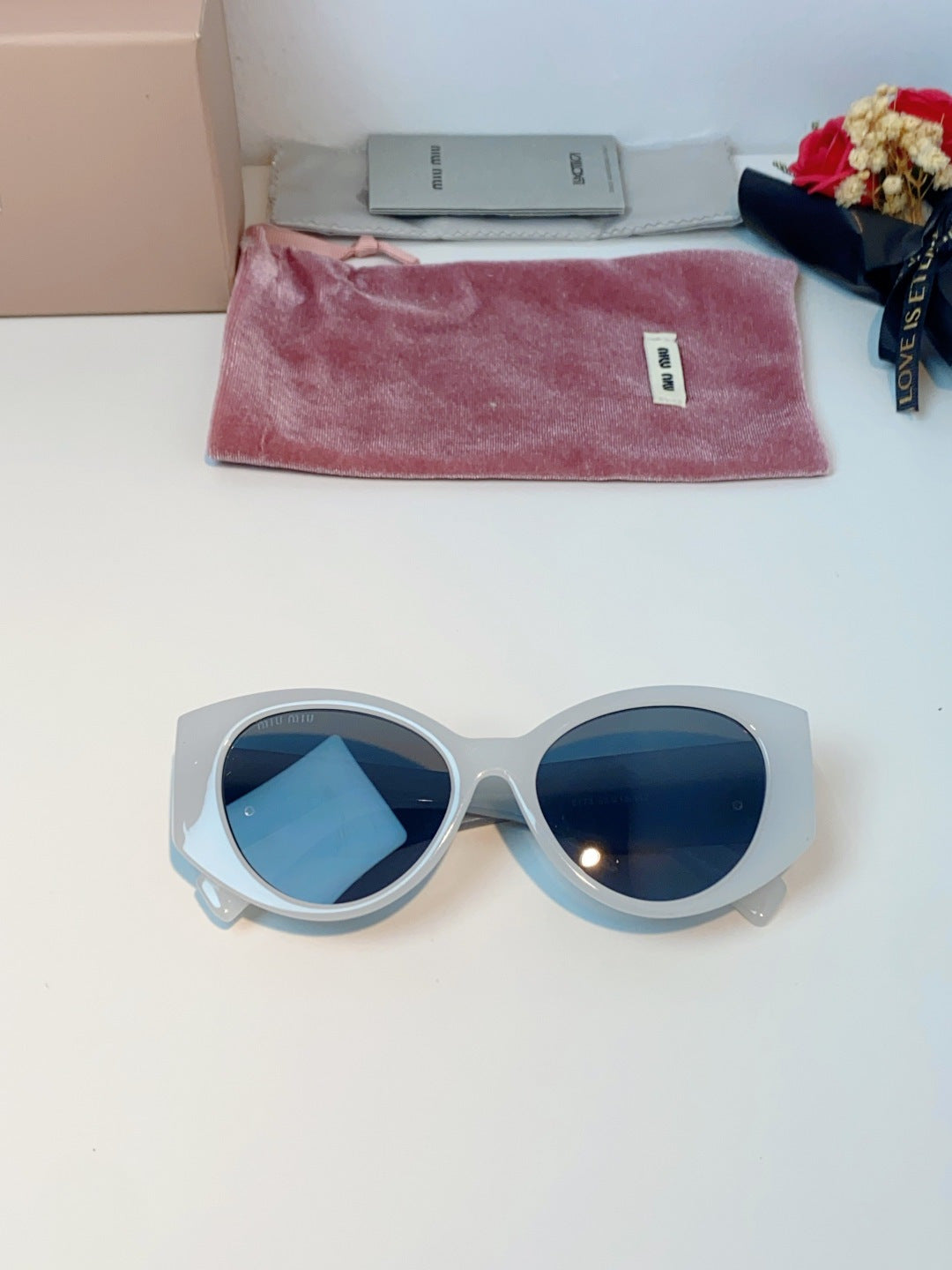 Miu Miu Polarized Cat-Eye Gray Lens Sunglasses for Men & Women - detail image 9