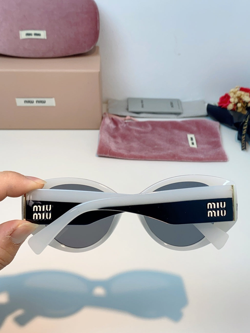 Miu Miu Polarized Cat-Eye Gray Lens Sunglasses for Men & Women - detail image 5