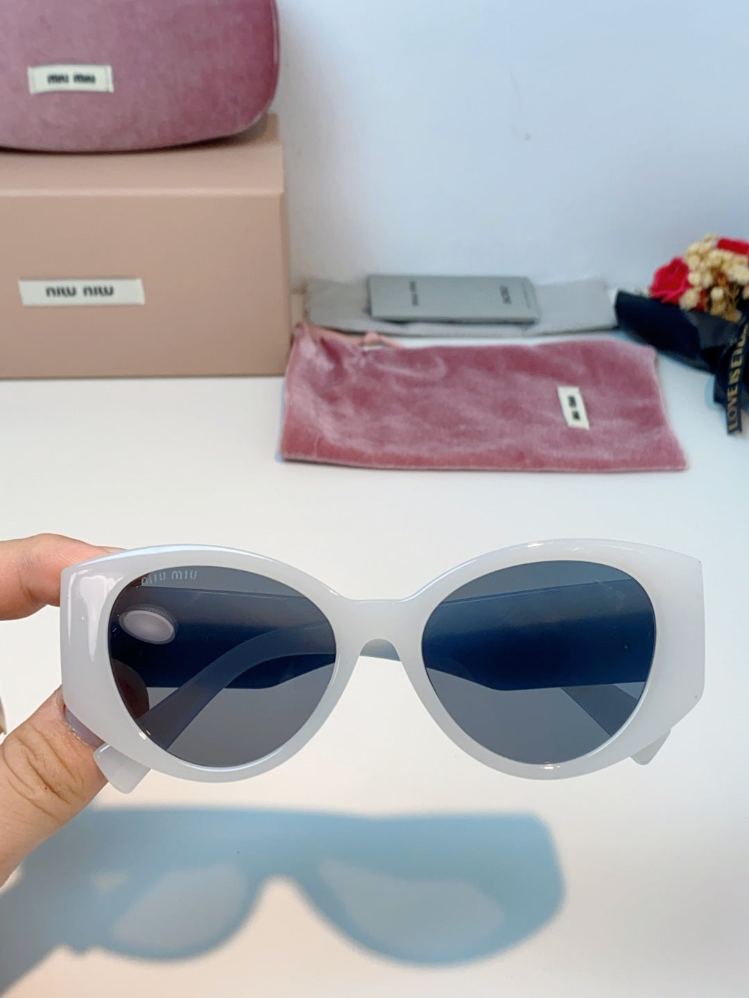 Miu Miu Polarized Cat-Eye Gray Lens Sunglasses for Men & Women - detail image 4