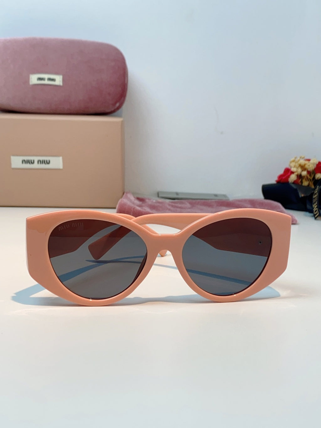 Miu Miu Polarized Cat-Eye Red Lens Sunglasses for Men & Women - detail image 2