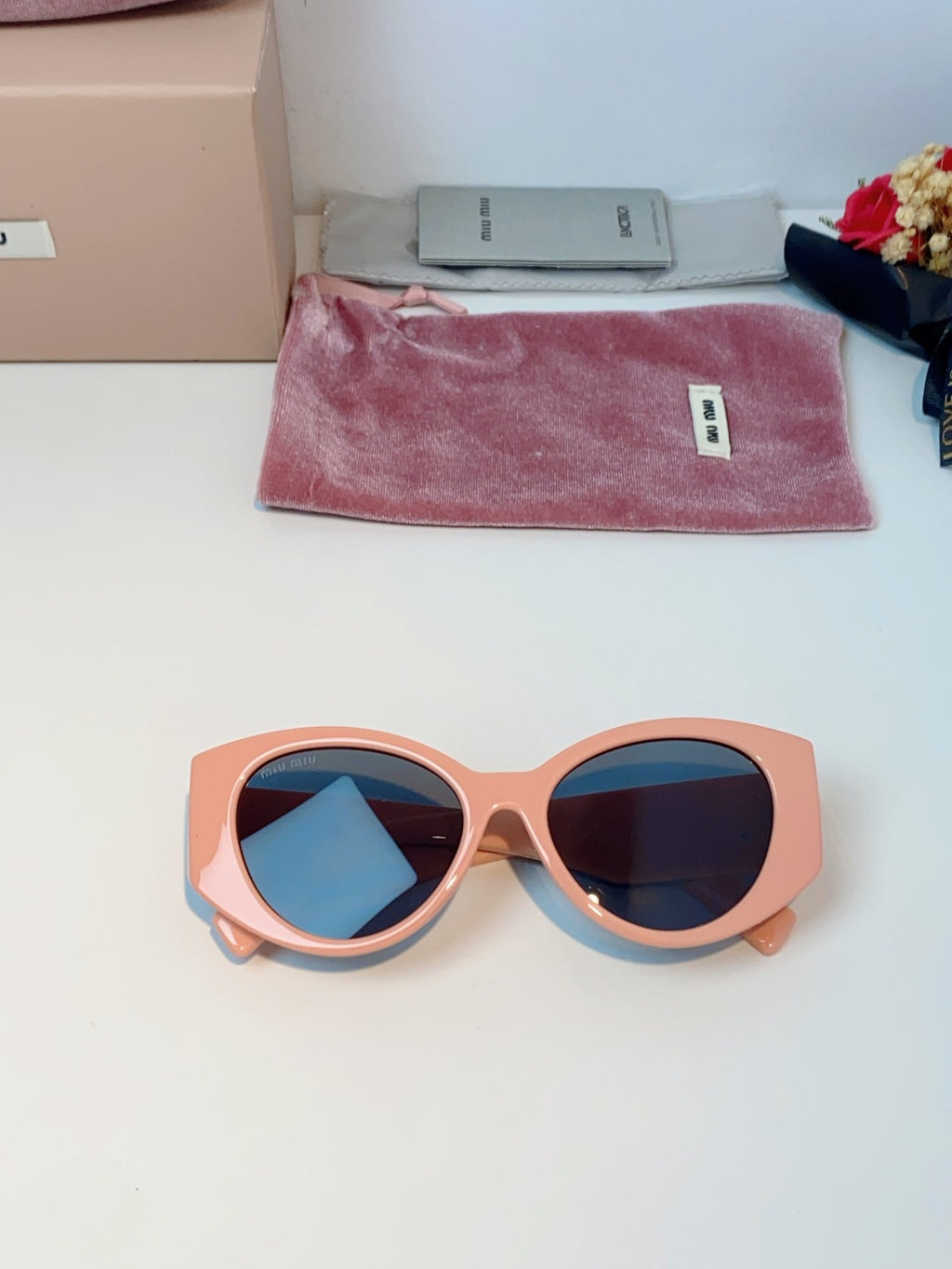 Miu Miu Polarized Cat-Eye Red Lens Sunglasses for Men & Women - detail image 9