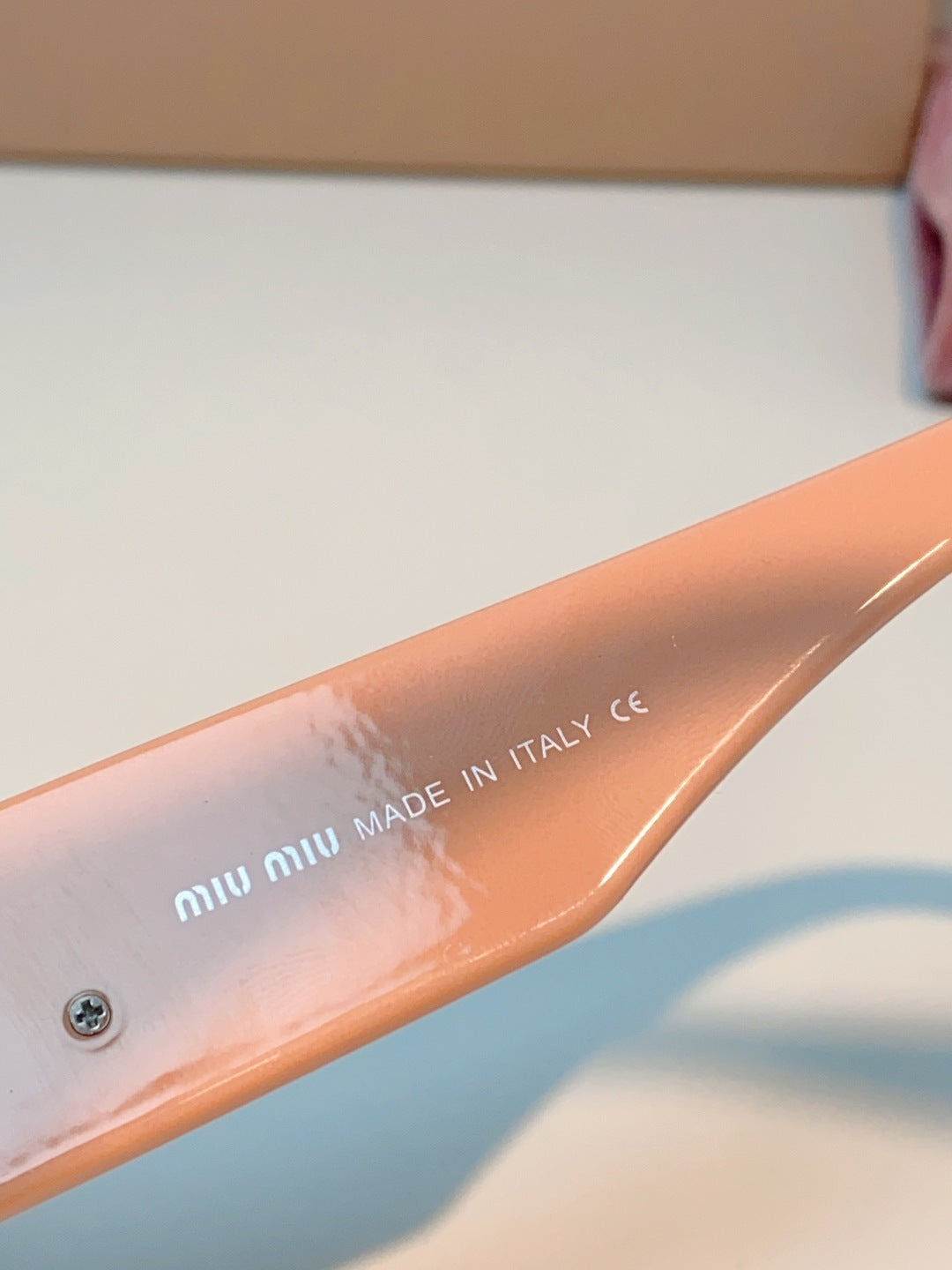 Miu Miu Polarized Cat-Eye Red Lens Sunglasses for Men & Women - detail image 8