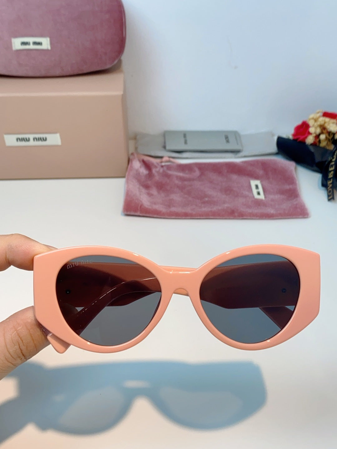 Miu Miu Polarized Cat-Eye Red Lens Sunglasses for Men & Women - detail image 4