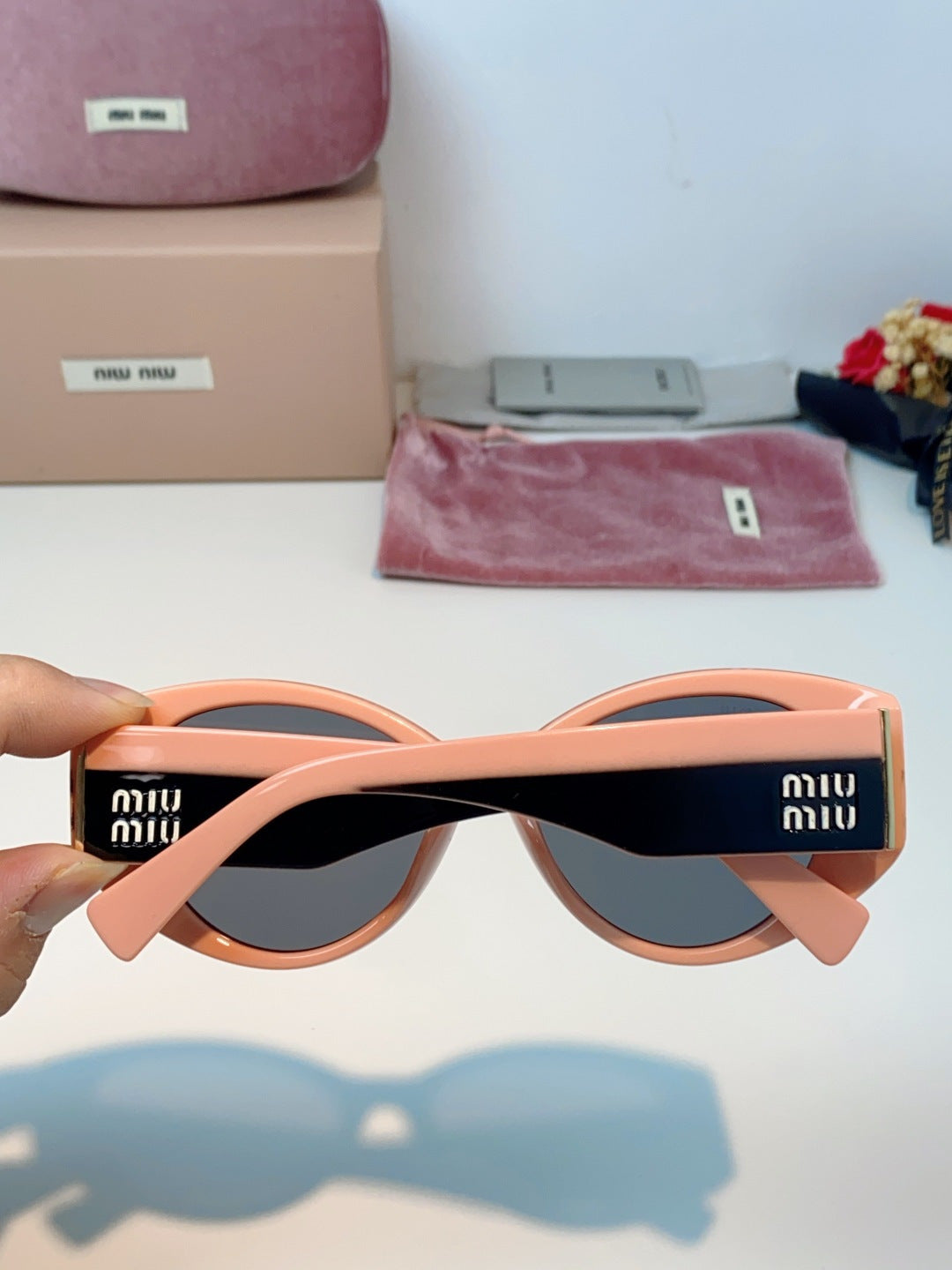Miu Miu Polarized Cat-Eye Red Lens Sunglasses for Men & Women - detail image 5