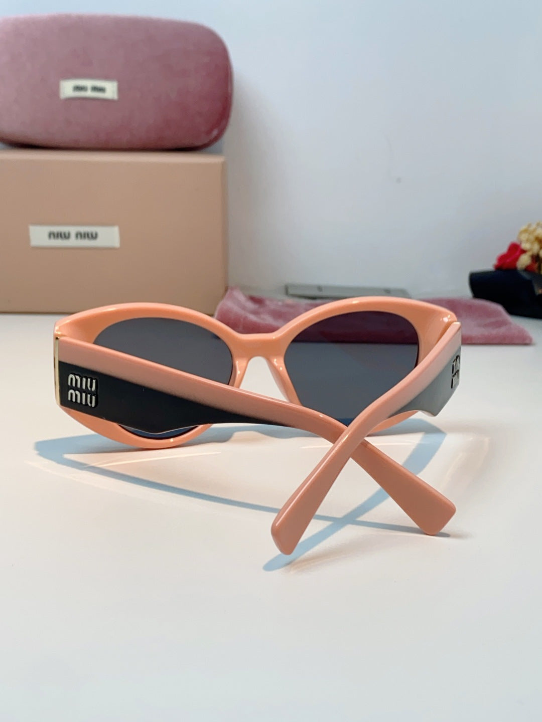 Miu Miu Polarized Cat-Eye Red Lens Sunglasses for Men & Women - detail image 3