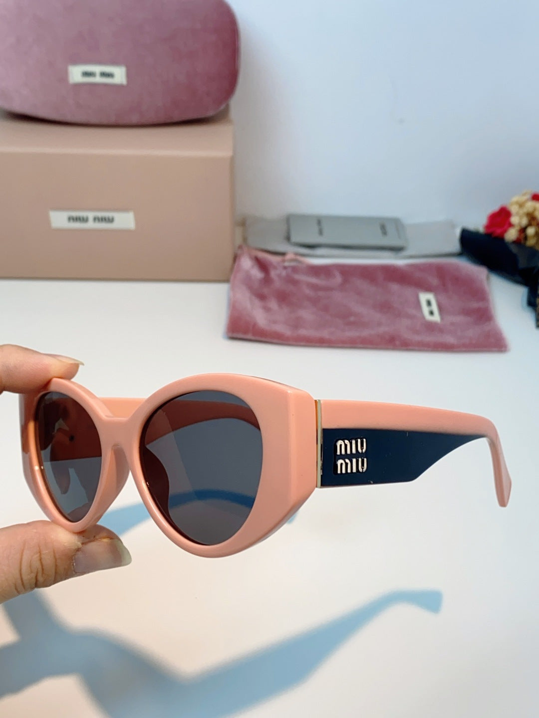 Miu Miu Polarized Cat-Eye Red Lens Sunglasses for Men & Women - detail image 6