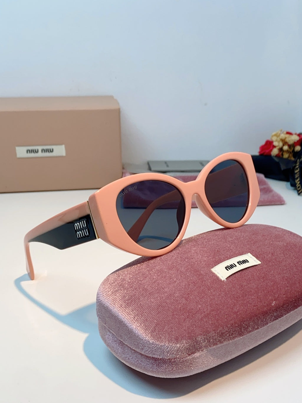 Miu Miu Polarized Cat-Eye Red Lens Sunglasses for Men & Women - detail image 10