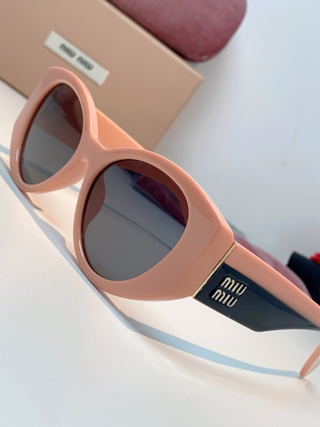Miu Miu Polarized Cat-Eye Red Lens Sunglasses for Men & Women - detail image 7