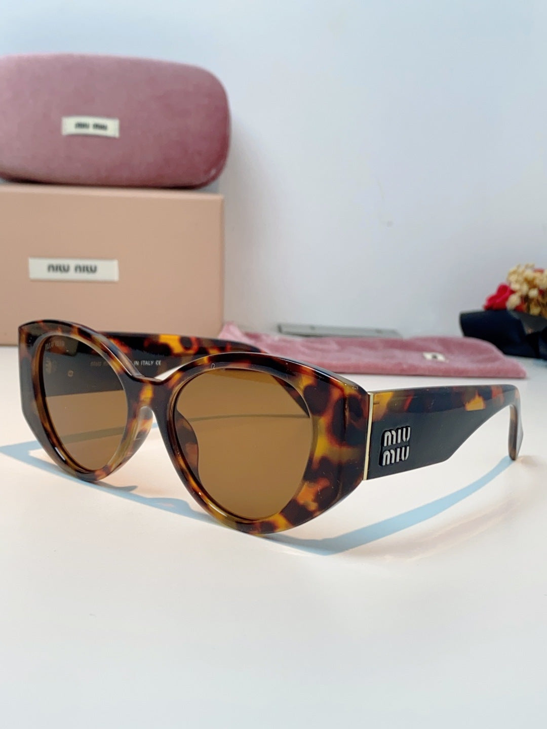 Miu Miu Polarized Cat-Eye Brown Lens Sunglasses for Men & Women