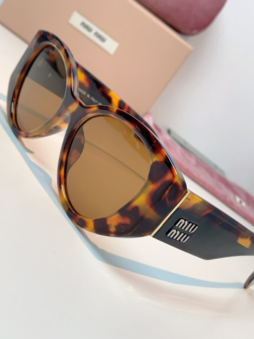 Miu Miu Polarized Cat-Eye Brown Lens Sunglasses for Men & Women - detail image 7